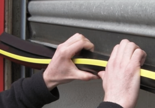how to install garage door weather stripping