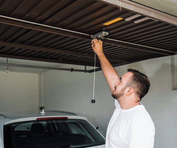 Measuring the height of garage door.