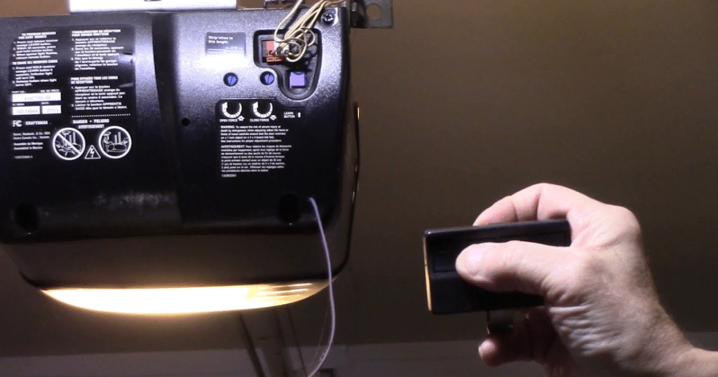 how to change battery in garage door opener