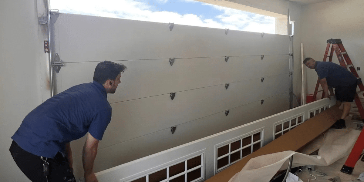 experts installing garage door
