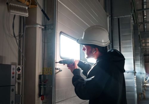 Engineer repairing an unloading gate