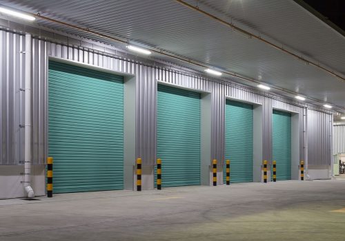 Shutter door or roller door and concrete floor outside factory building use for industrial background.